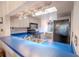 Kitchen with blue countertops and stainless steel appliances at 3743 Teeside Dr, New Port Richey, FL 34655