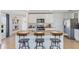 Modern kitchen with granite countertops and white cabinets at 5253 Salt Marsh Rd, Wimauma, FL 33598