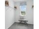Large walk-in closet with shelving and bench at 5259 Salt Marsh Rd, Wimauma, FL 33598