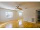 Bright bedroom with hardwood floors and ceiling fan at 540 Newton S Ave, St Petersburg, FL 33701