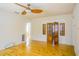 Spacious living room with hardwood floors and French doors at 540 Newton S Ave, St Petersburg, FL 33701