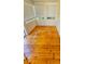 Bright sunroom featuring hardwood floors and window blinds at 540 Newton S Ave, St Petersburg, FL 33701