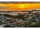 Stunning sunset aerial view of waterfront homes and community at 5940 Pelican Bay S Plz # 1106, Gulfport, FL 33707