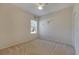 Simple bedroom with carpet flooring and a window at 10234 Evergreen Hill Dr, Tampa, FL 33647