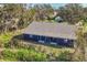 Aerial view of a house under construction, showcasing its unique design at 1040 31St E St, Palmetto, FL 34221