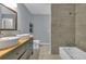 Modern bathroom with double vanity and tile shower at 1040 31St E St, Palmetto, FL 34221