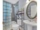 Bathroom with a shower/tub combo, vanity, and updated fixtures at 1040 31St E St, Palmetto, FL 34221