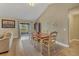 Bright dining room featuring hardwood floors and a wood table at 1040 31St E St, Palmetto, FL 34221