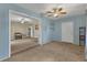 Open living room with neutral color palette and carpet at 1040 31St E St, Palmetto, FL 34221