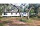Mobile home exterior view, needs some work at 12403 Banbury Ave, New Port Richey, FL 34654