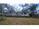 Mobile home exterior view, needs repairs at 12403 Banbury Ave, New Port Richey, FL 34654