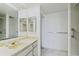 Bathroom with a tiled floor, vanity, mirror, and walk in shower at 1501 Gulf Blvd # 604, Clearwater Beach, FL 33767