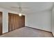 Bedroom with double closet and ceiling fan at 1903 Country Club Ct, Plant City, FL 33566