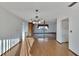 Light-filled dining room with hardwood floors and chandelier at 1903 Country Club Ct, Plant City, FL 33566