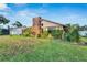 Brick home with chimney and large backyard at 1903 Country Club Ct, Plant City, FL 33566