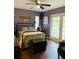 Main bedroom with hardwood floors and access to backyard at 37210 Bermont Rd, Punta Gorda, FL 33982
