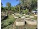 Backyard garden with raised garden beds and various plants at 37210 Bermont Rd, Punta Gorda, FL 33982