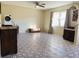 Living room featuring tile flooring and a charming vintage aesthetic at 37210 Bermont Rd, Punta Gorda, FL 33982