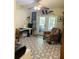 Home office with ample natural light and comfortable seating at 37210 Bermont Rd, Punta Gorda, FL 33982