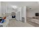 Well-equipped kitchen offering white cabinetry and ample counter space at 404 Brandywine Dr, Largo, FL 33771