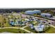 Aerial view of community park with playground, skate park, and walking trails at 4220 Fairway Run # 0, Tampa, FL 33618