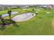 Aerial view of golf course with ponds at 6180 Sun Blvd # 201, St Petersburg, FL 33715