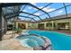 Enjoy this large pool and spa with a screened enclosure at 902 Flatwood Ct, Brandon, FL 33511