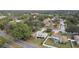 Aerial view showcasing home's location in a residential neighborhood at 970 Rolling Hills Dr, Palm Harbor, FL 34683