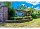Westlake Village entrance sign welcomes residents at 970 Rolling Hills Dr, Palm Harbor, FL 34683