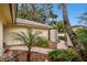 Landscaped walkway leads to the home's entrance at 970 Rolling Hills Dr, Palm Harbor, FL 34683