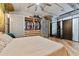Bright bedroom with large closet, ceiling fan, and hardwood floors at 101 N 12Th St # 207, Tampa, FL 33602