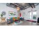 Stylish condo lobby with modern furniture and exposed ductwork at 101 N 12Th St # 207, Tampa, FL 33602