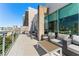 Outdoor patio with seating, grill and city views at 101 N 12Th St # 207, Tampa, FL 33602