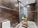 Walk-in shower with dark tile and a modern, minimalist design at 101 N 12Th St # 207, Tampa, FL 33602