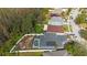 Aerial view showing home with pool and fenced backyard at 10212 Grant Creek Dr, Tampa, FL 33647