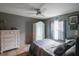 Cozy bedroom with double bed, dresser, and ample closet space at 10212 Grant Creek Dr, Tampa, FL 33647