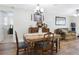 Classic dining room with hardwood floors and a vintage table set at 11040 126Th Ter, Largo, FL 33778