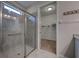 Modern bathroom with a large shower and updated fixtures at 11976 Blazing Star Dr, Venice, FL 34293