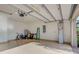Attached garage with car, bicycle and storage space at 11976 Blazing Star Dr, Venice, FL 34293