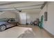 Attached garage with space for a car, bicycle, and storage at 11976 Blazing Star Dr, Venice, FL 34293