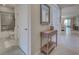 Hallway leading to bathroom and other rooms at 11976 Blazing Star Dr, Venice, FL 34293