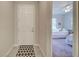 Hallway with access to a bedroom and additional rooms at 11976 Blazing Star Dr, Venice, FL 34293