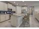 Modern kitchen with stainless steel appliances and granite countertops at 11976 Blazing Star Dr, Venice, FL 34293