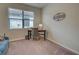 Home office with desk and chair, providing a workspace at 11976 Blazing Star Dr, Venice, FL 34293