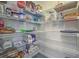 Well-organized pantry with ample shelving for storage at 11976 Blazing Star Dr, Venice, FL 34293