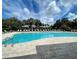 Resort-style pool with plenty of lounge chairs at 11976 Blazing Star Dr, Venice, FL 34293