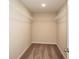 Large walk-in closet with wire shelving at 14715 Summer Branch Dr, Lithia, FL 33547