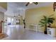Bright Gathering room with tiled floors, access to pool, and vaulted ceiling at 1612 Sunset Dr, Tarpon Springs, FL 34689