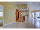 Open concept Gathering room with tile floors, high ceilings and access to patio at 1612 Sunset Dr, Tarpon Springs, FL 34689