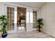 Bright sunroom with French doors and access to the main living space at 1612 Sunset Dr, Tarpon Springs, FL 34689